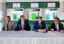 صورة تبادل المهام بين المدير العام السابق والجديد للصندوق الوطني للتأمين الصحي