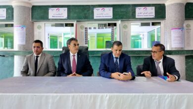 صورة تبادل المهام بين المدير العام السابق والجديد للصندوق الوطني للتأمين الصحي